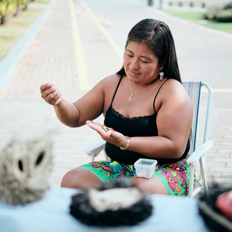 Indigenous People Crafting Souvenirs For Sale